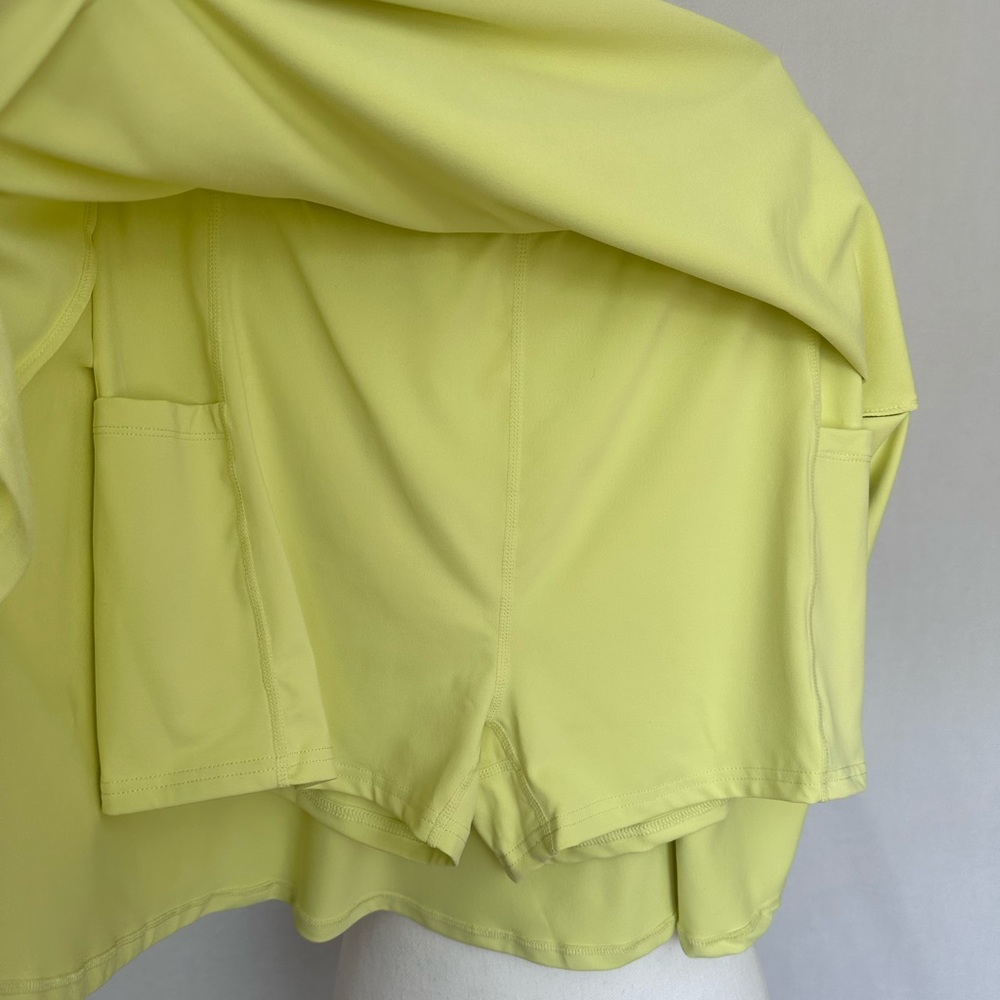 NWT Fabletics Flounce Skirt - LG - Lemon Crème skirt w/built-in shorts & pockets - Picture 5 of 16